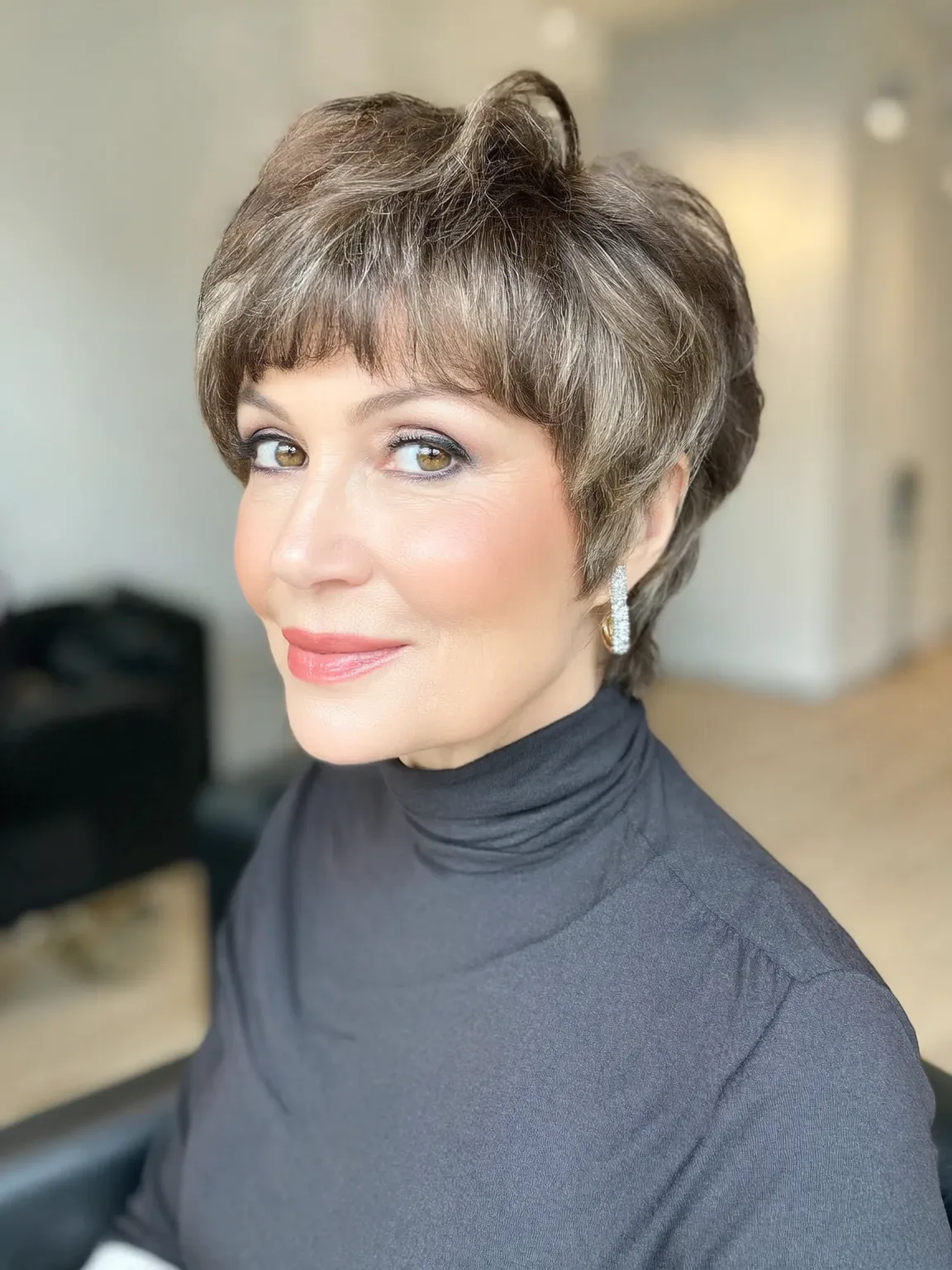 Textured Pixie in Soft Silver Brown with Side Swept Bangs