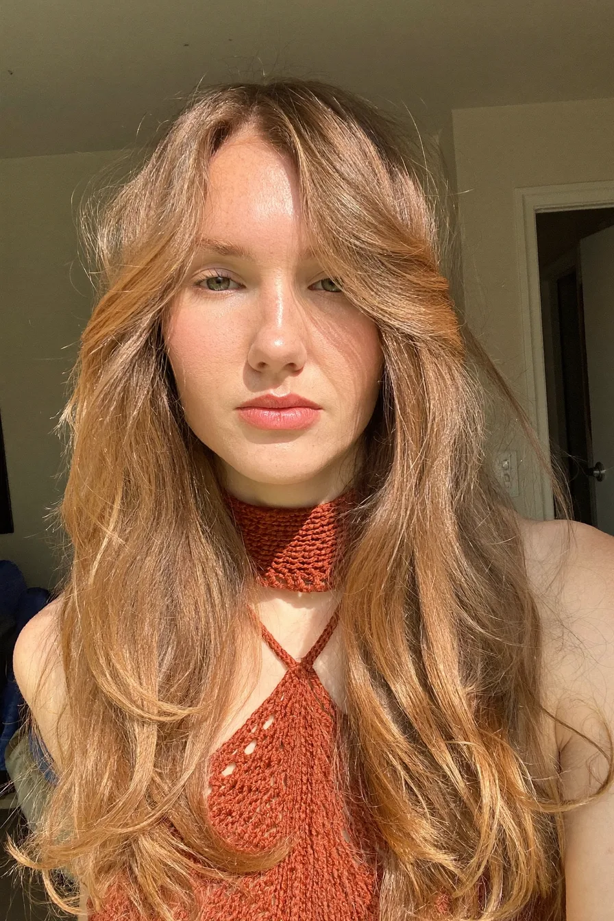 Sun-Kissed Long Layered Haircut with Effortless Curtain Bangs