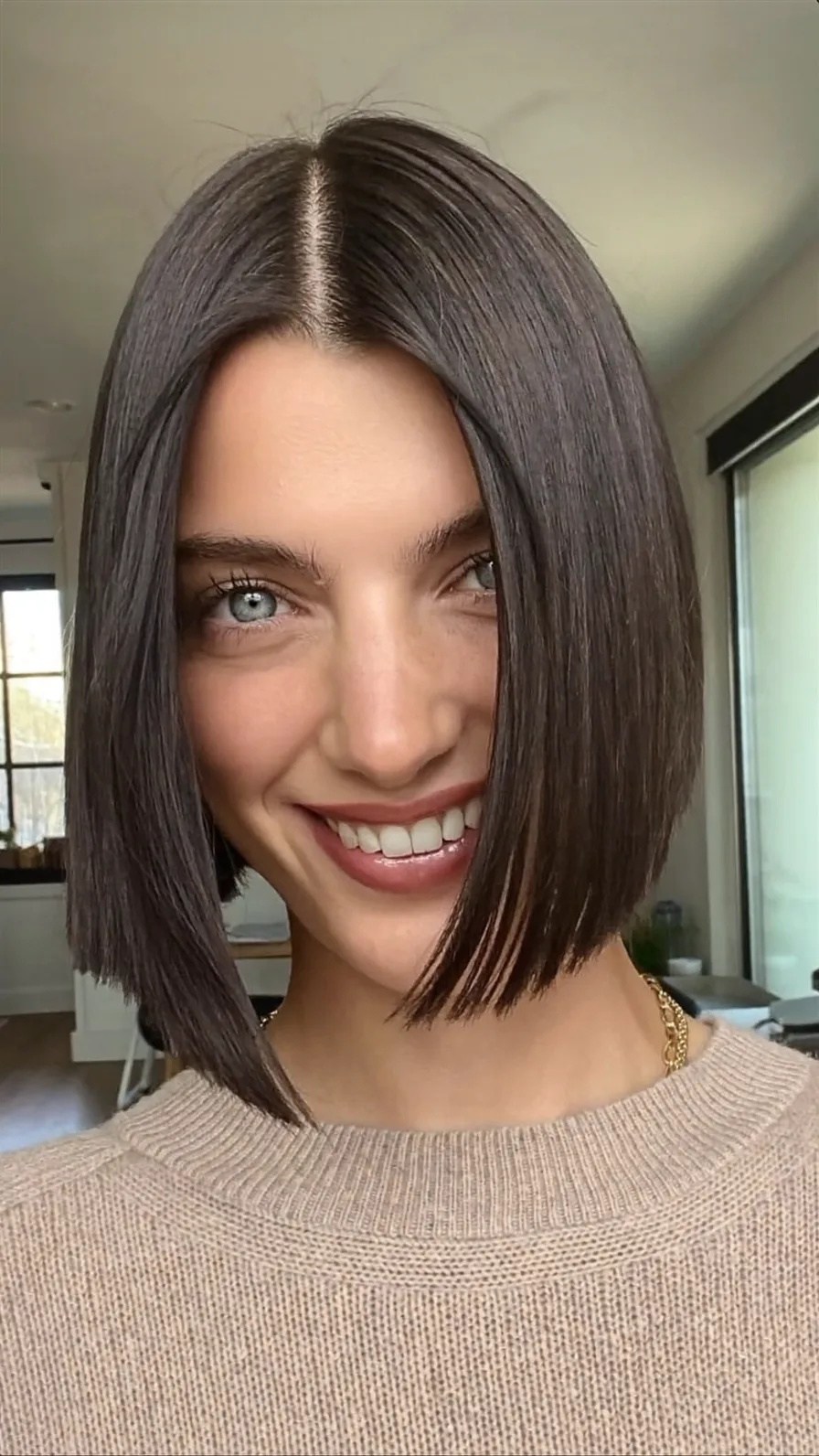 Sleek Center-Parted Blunt Chin-Length Bob Hairstyle