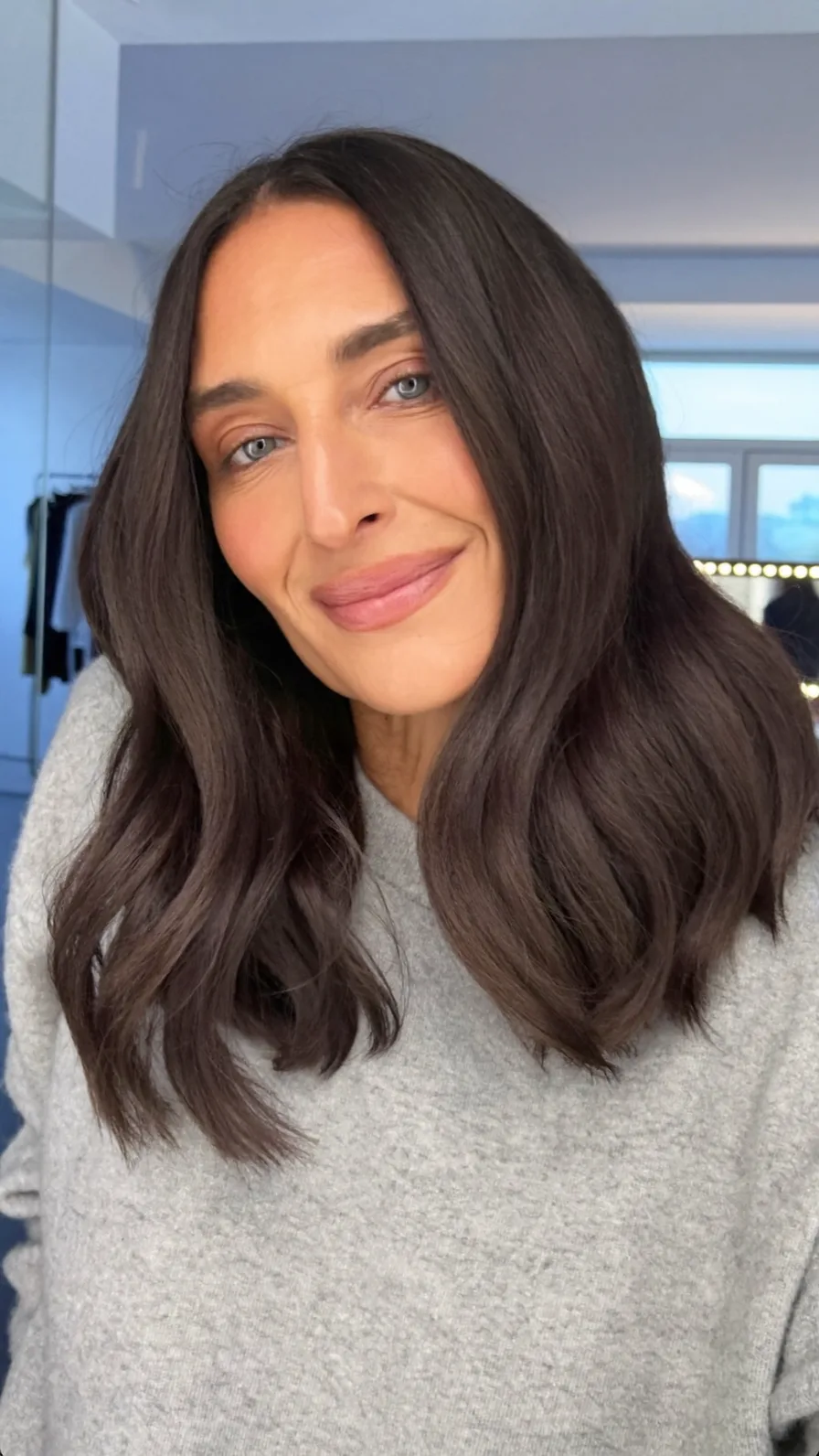 Classic Medium-Length Wavy Layers with Center Part