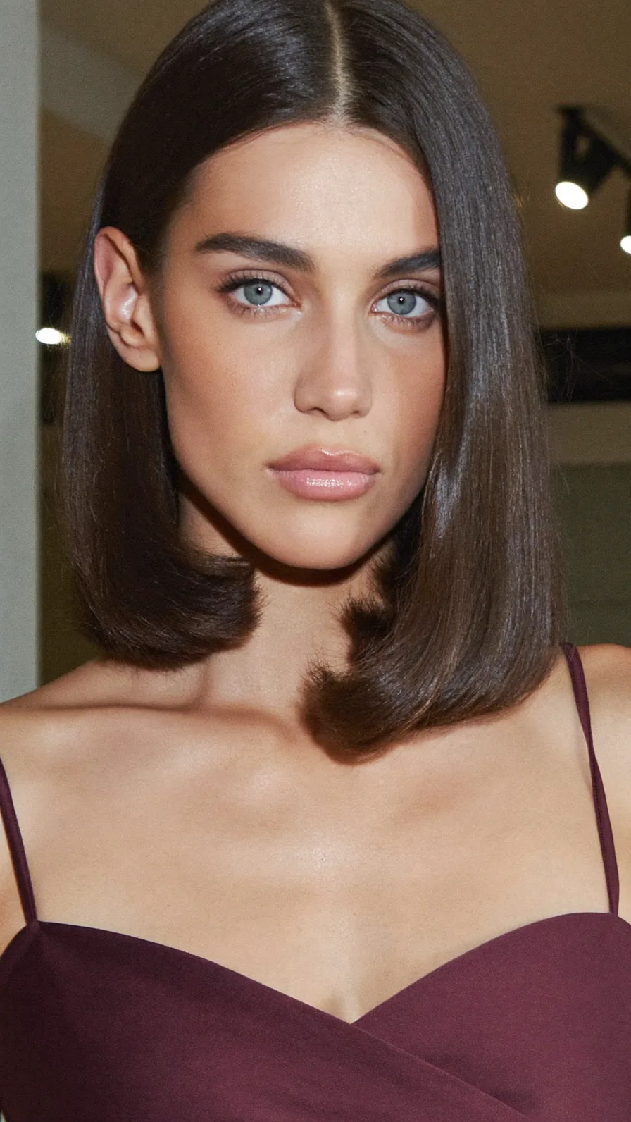 Sleek Center-Parted Blunt Bob with Medium Volume