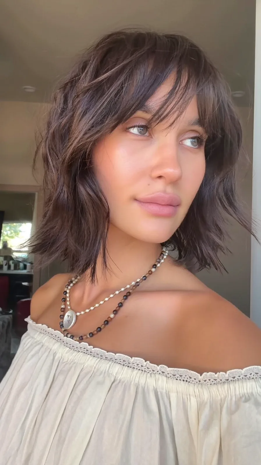Textured Chin-Length Shag with Wispy Curtain Bangs