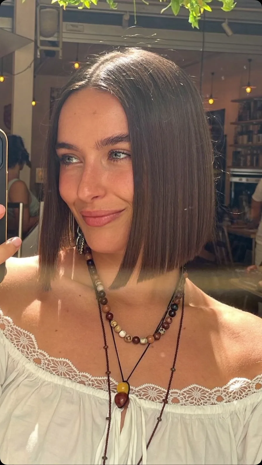 Sleek Chin-Length Blunt Bob With Center Parting