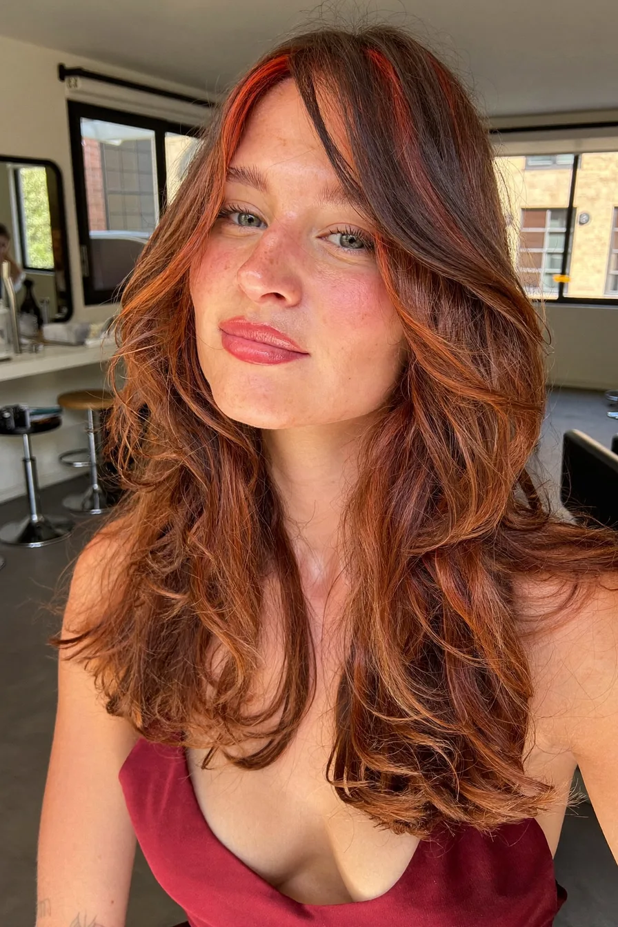 Voluminous Copper Red Long Layered Cut with Curtain Bangs