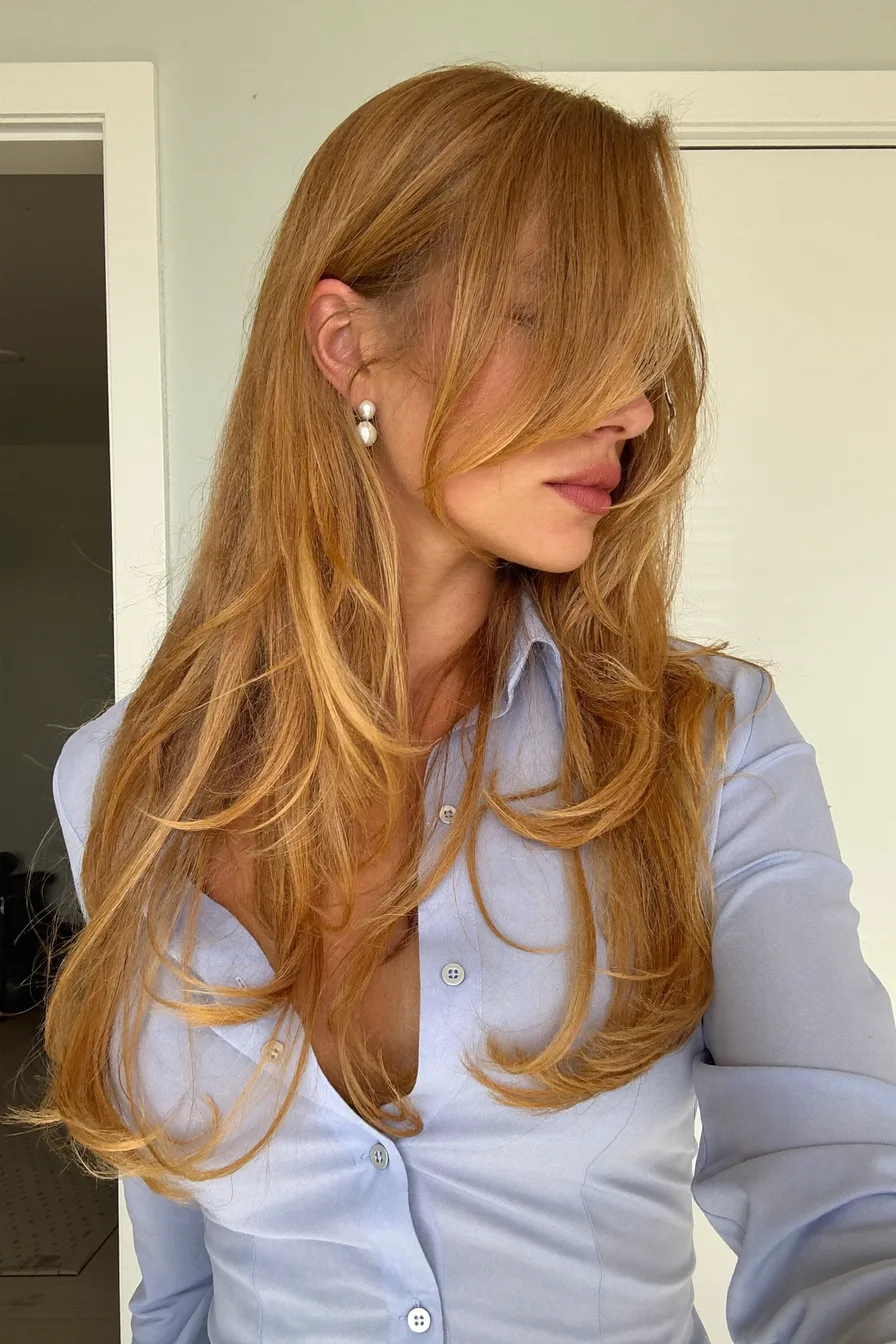 Dimensional Long Layered Cut with Face-Framing Side-Swept Bangs