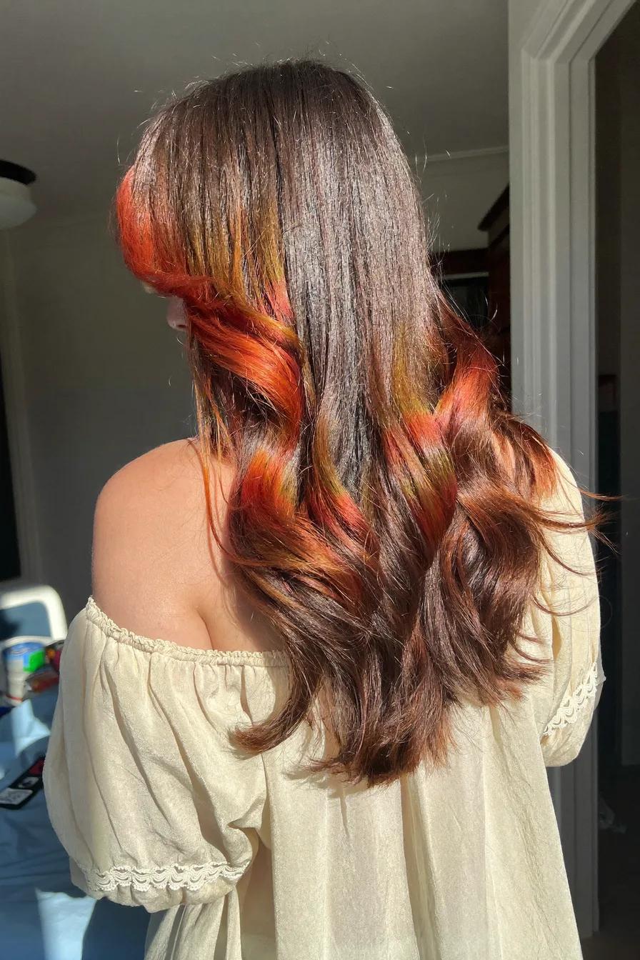 Fiery Auburn Long Layered Cut With Side-Swept Bangs