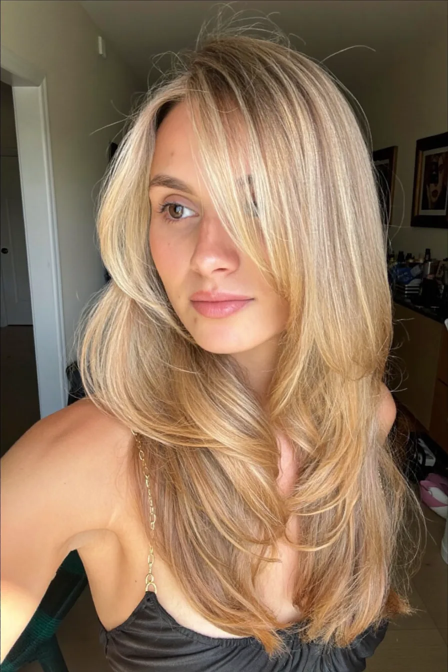 Softly Voluminous Long Layered Haircut with Side-Swept Bangs