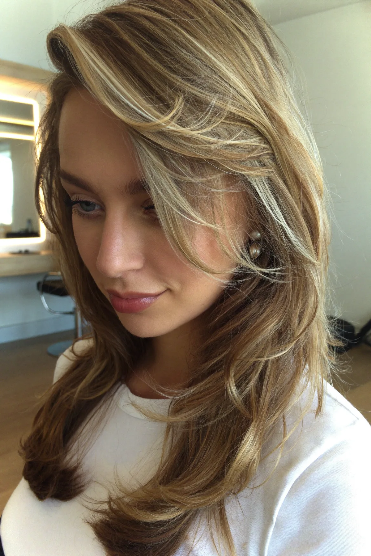 Honey Golden Blonde Wavy Lob with Curtain Bangs and Balayage