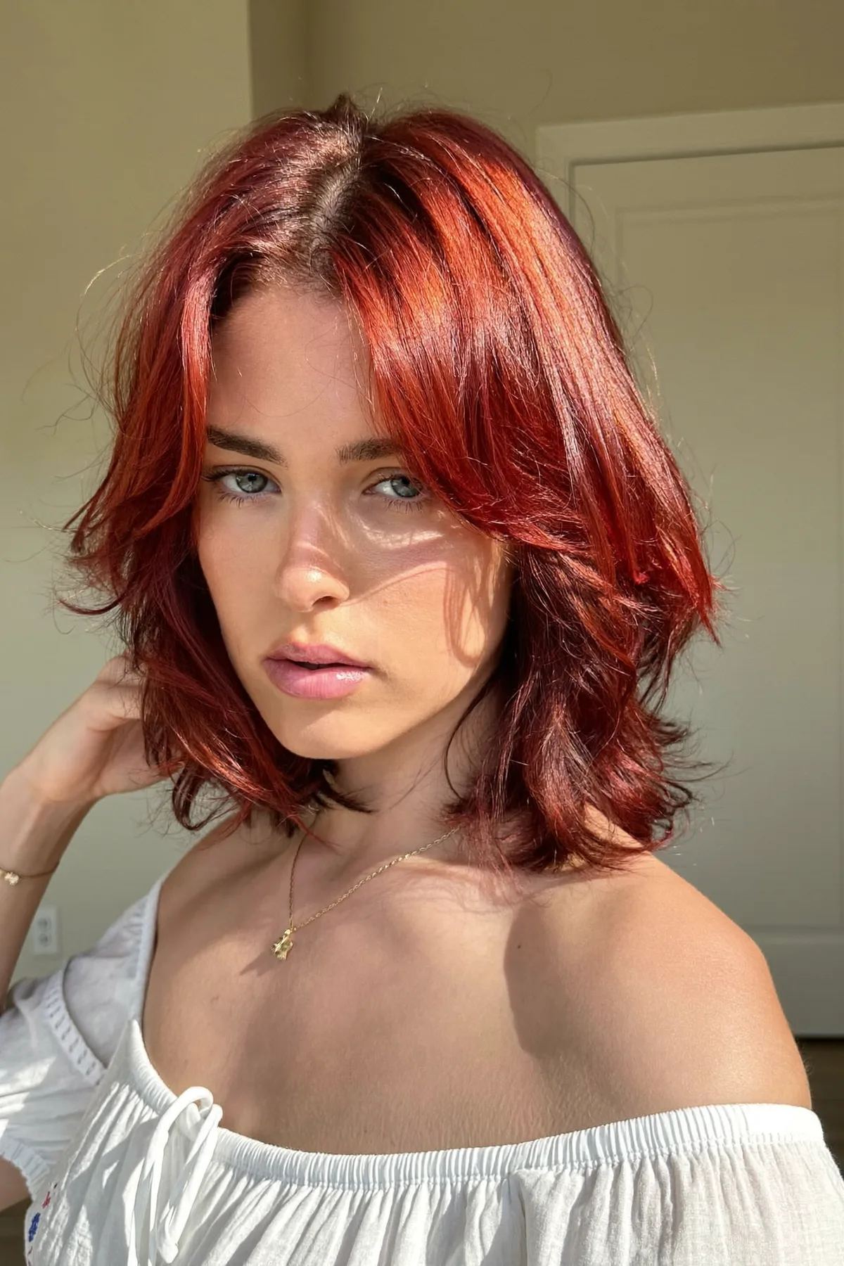Vivid Red Burgundy Collarbone-Length Lob with Curtain Bangs