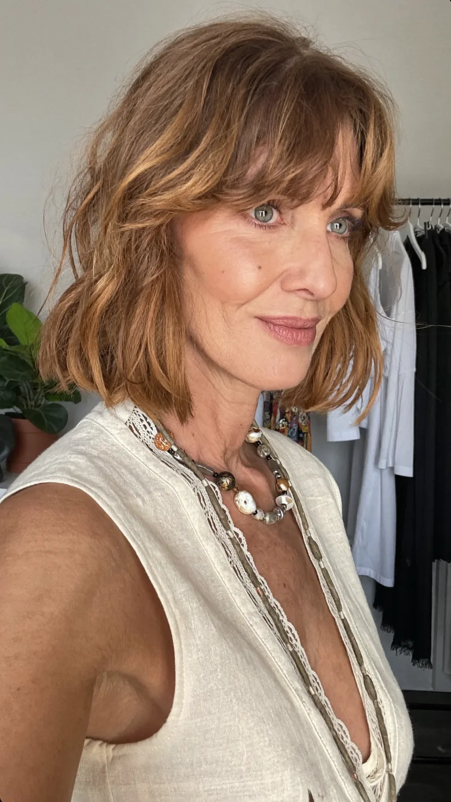 Choppy Layered Chin-Length Bob with Warm Honey Highlights