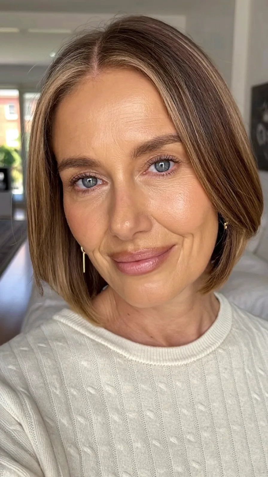 Chin-Length Blunt Bob with Center Part and Subtle Highlights