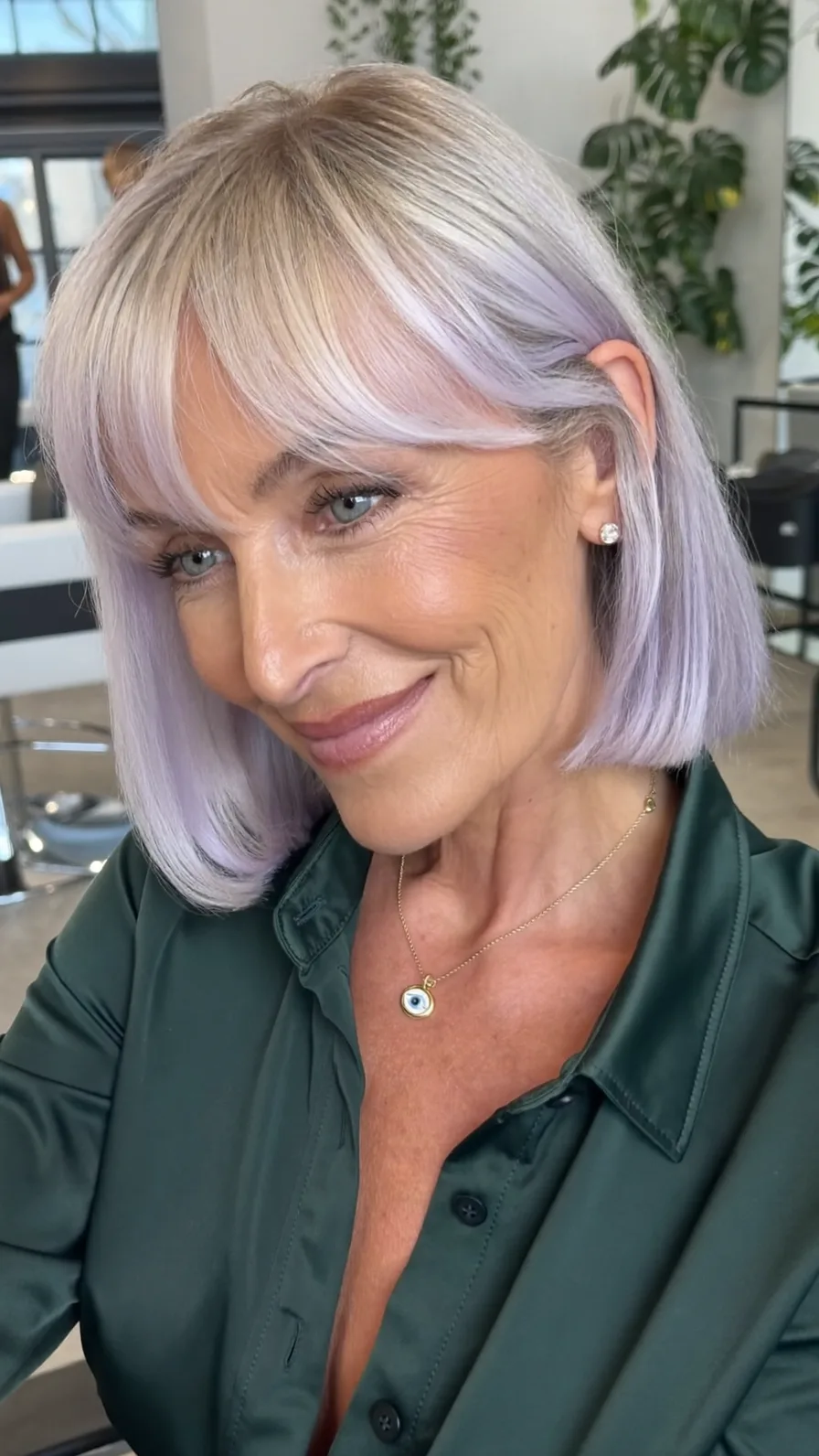 Chic Chin-Length Platinum Blonde Bob with Soft Curtain Bangs
