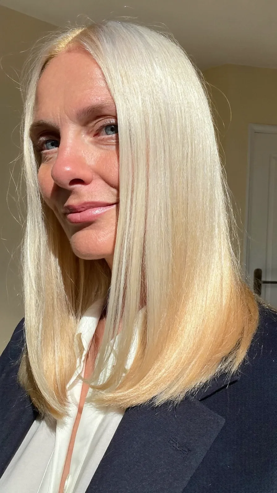 Sleek Platinum Blonde Blunt Lob with Center Part