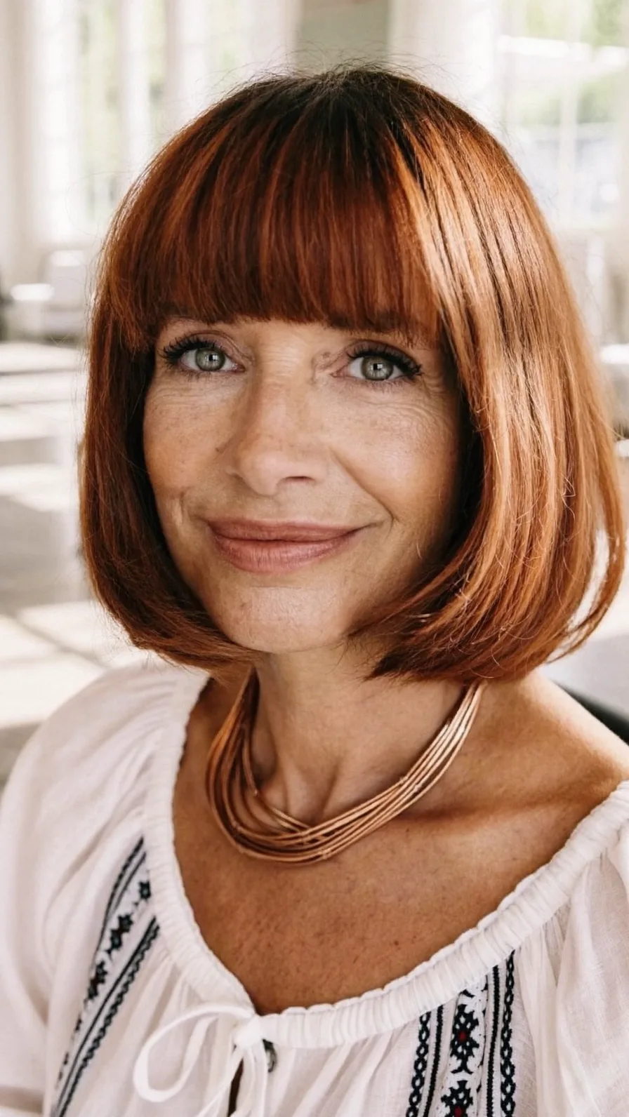 Classic Chin-Length Bob with Blunt Bangs in Auburn Copper