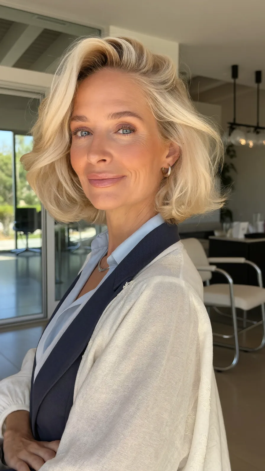 Voluminous Side-Swept Platinum Blonde Textured Bob