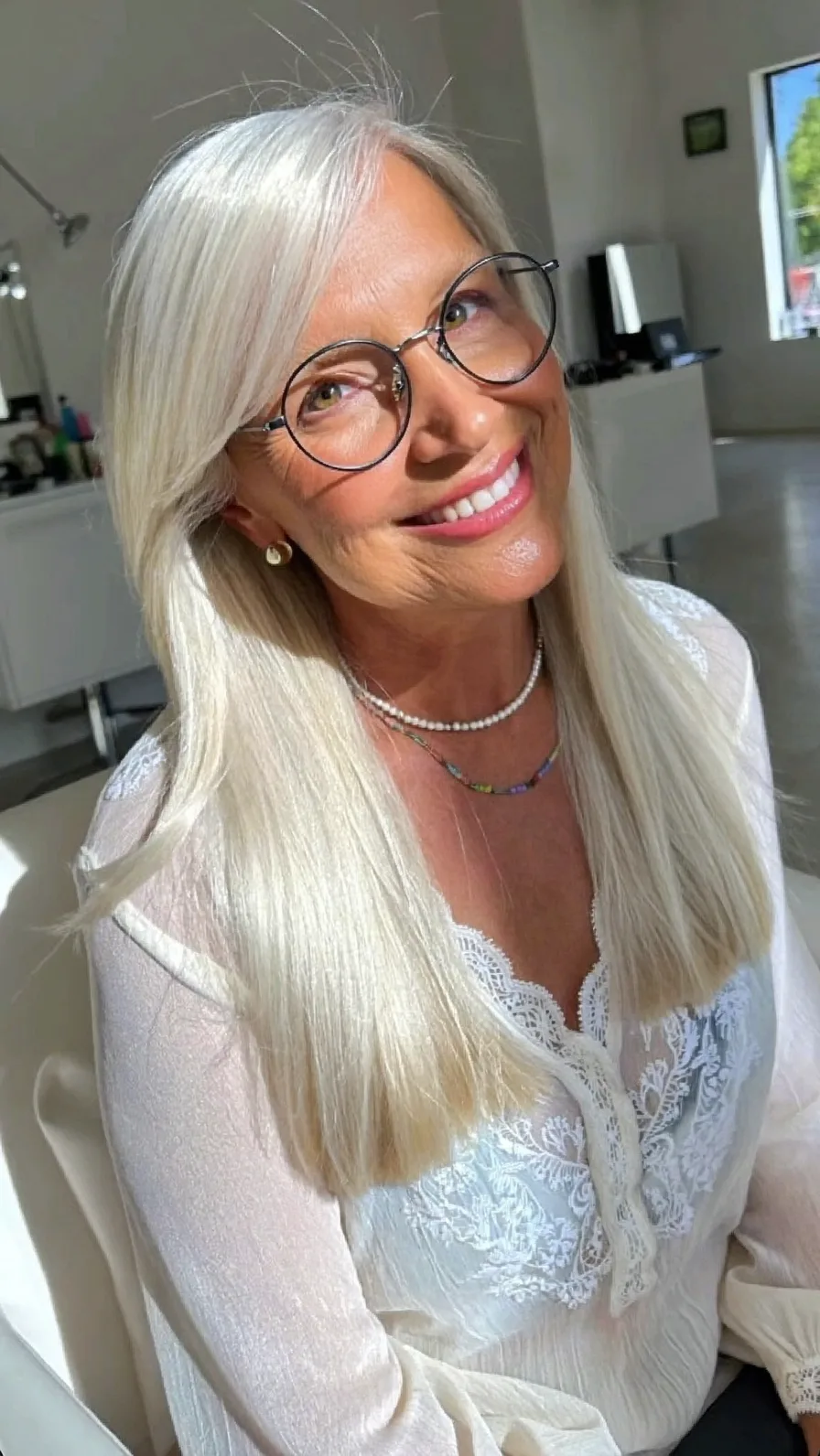 Elegant Platinum Silver Long Layers with Side-Swept Bangs