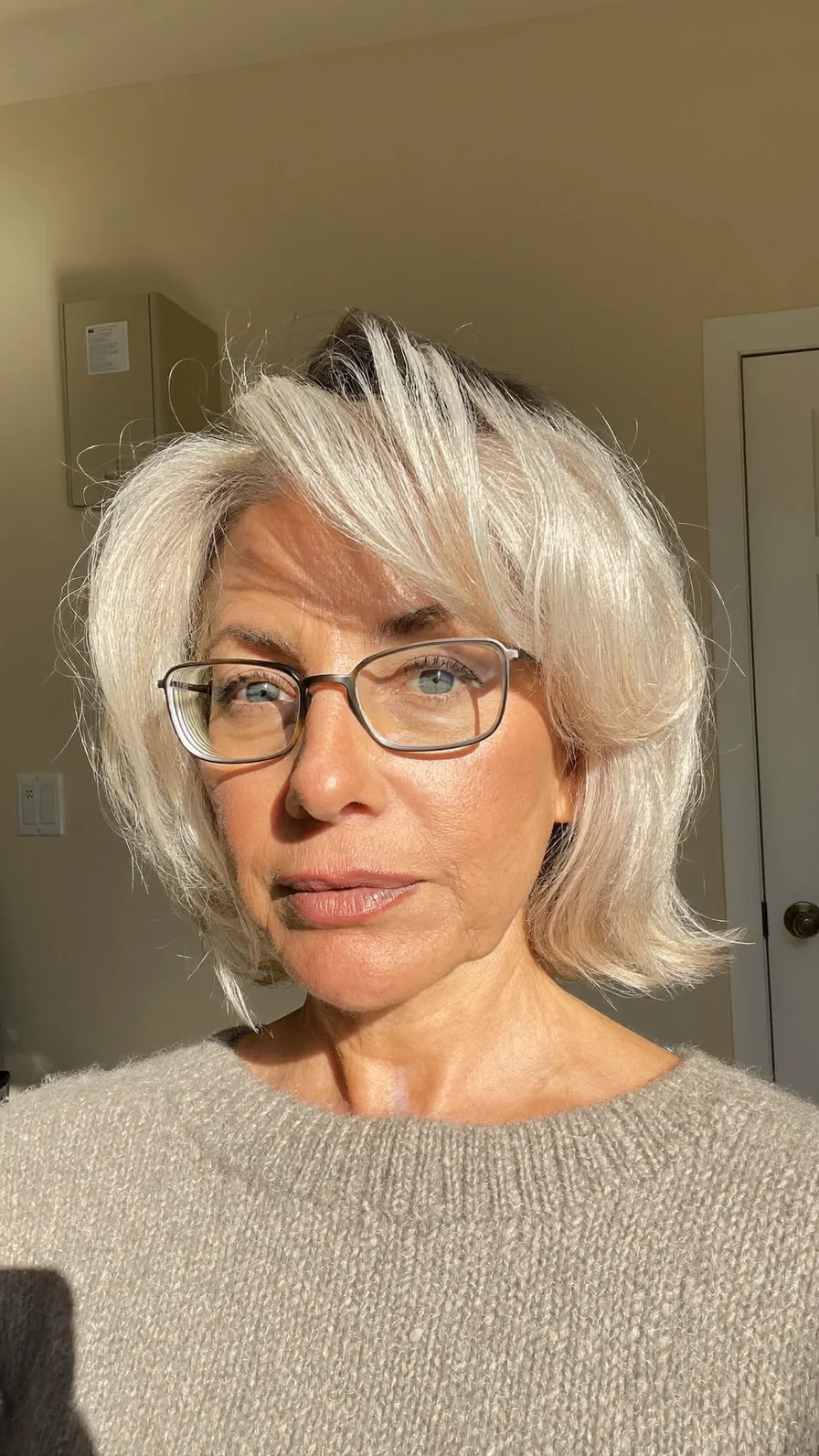 Classic Chin-Length Platinum Silver Bob with Side-Swept Bangs