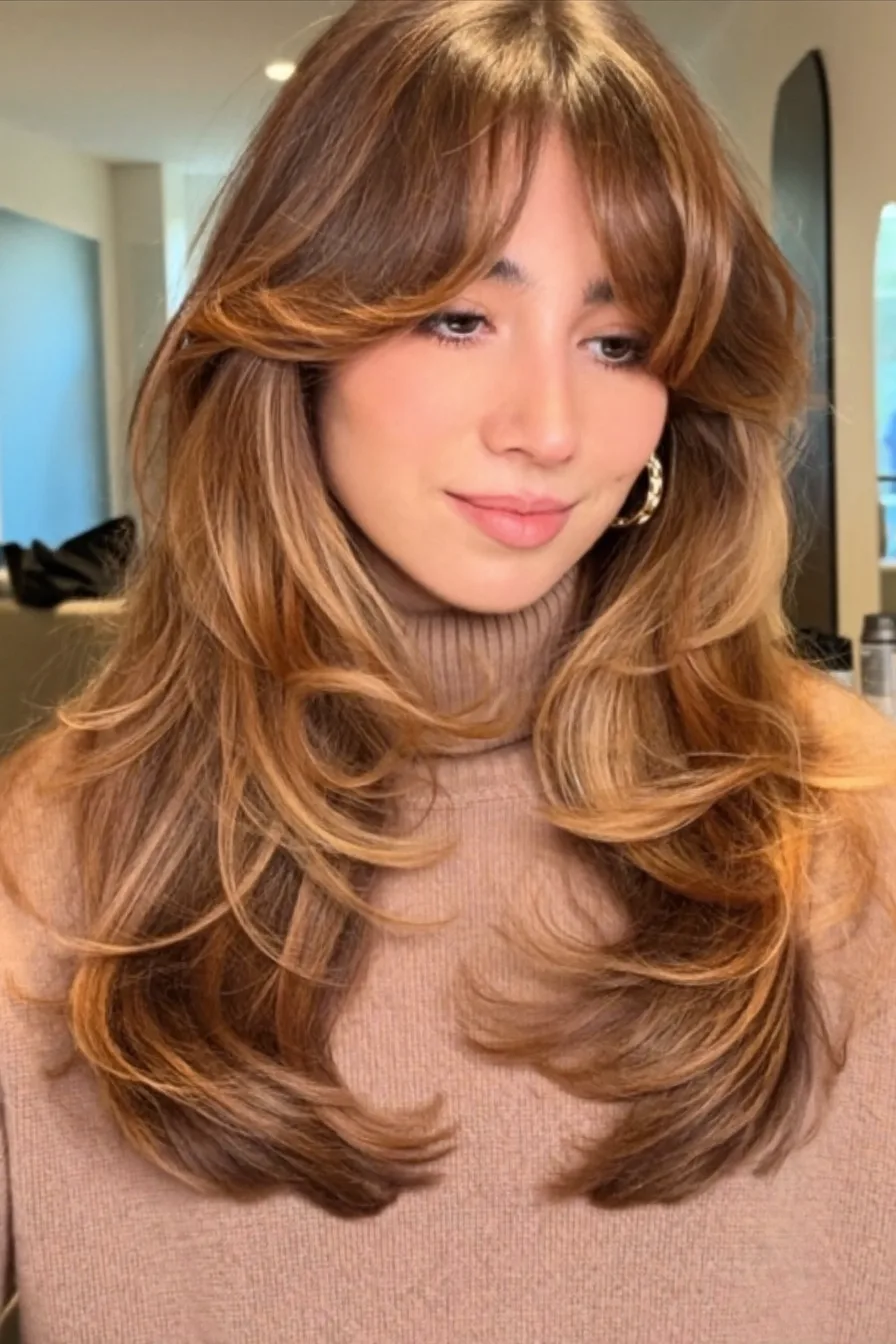Soft Face-Framing Honey Blonde Long Layered Haircut with Curtain Bangs