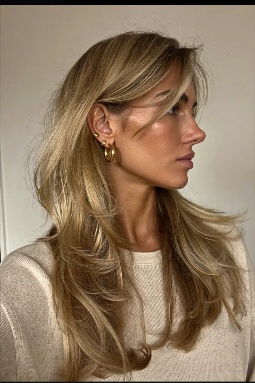Soft Face-Framing Honey Blonde Long Layered Haircut with Volume