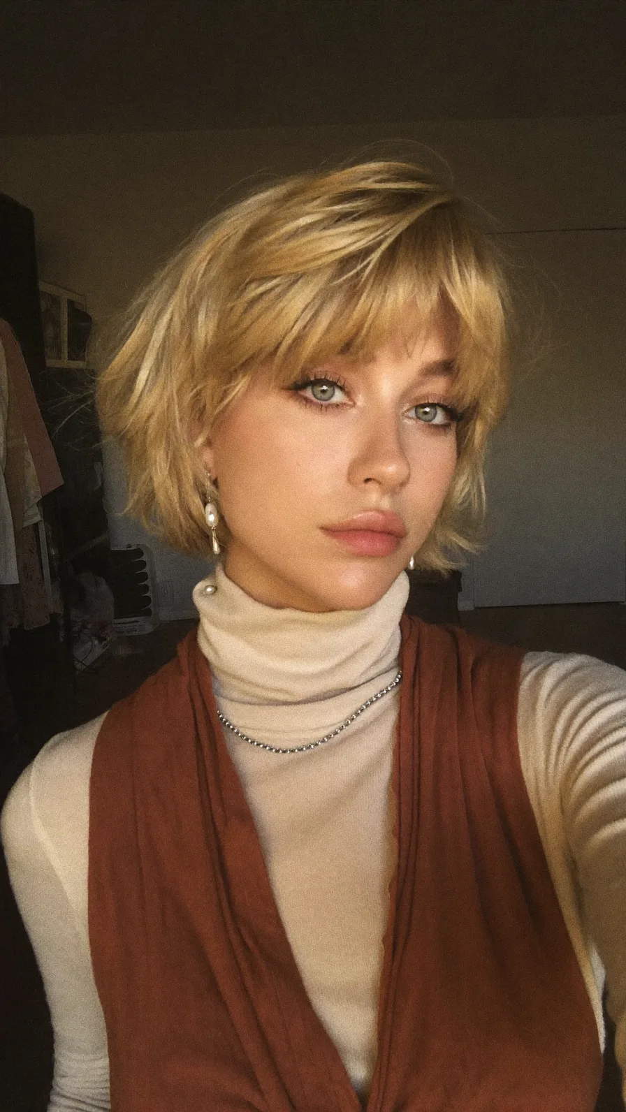 Modern Textured Chin-Length Bob with Wispy Blonde Bangs