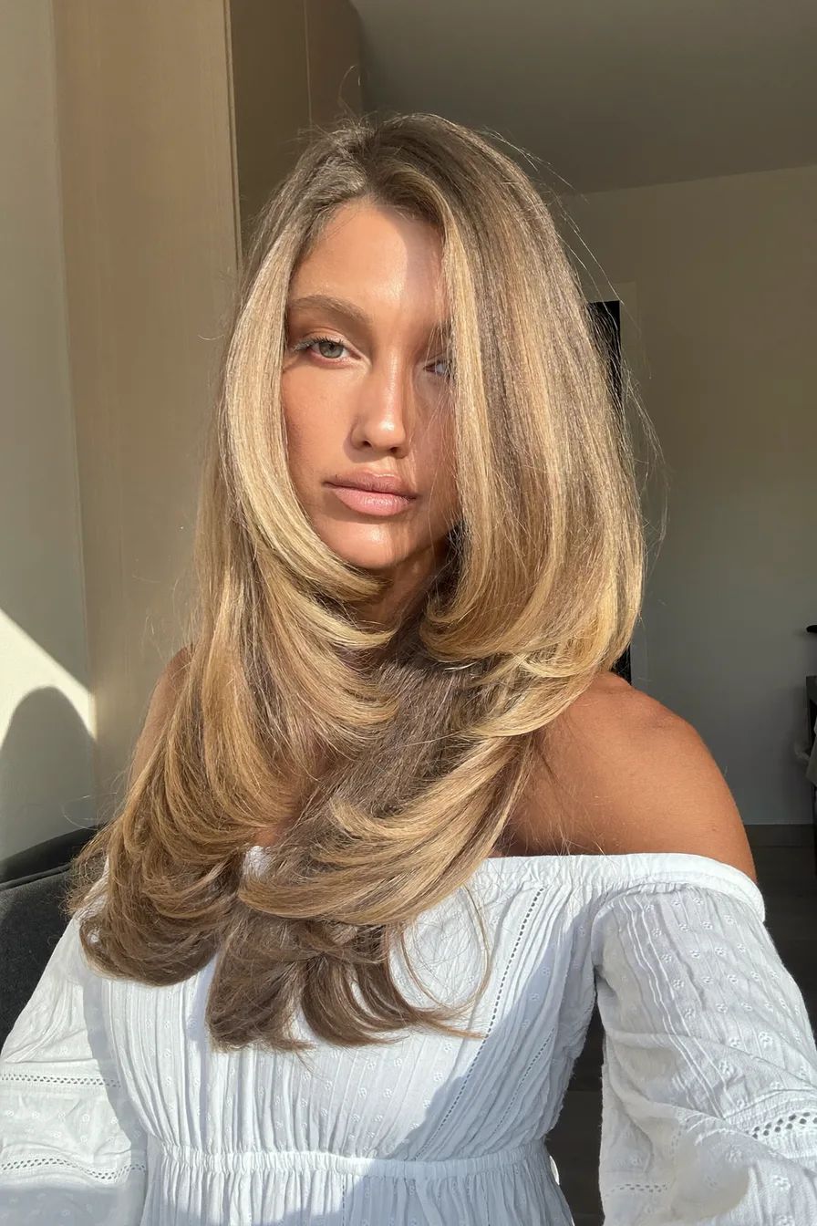 Sun-Kissed Long Layers with Golden Blonde Shine