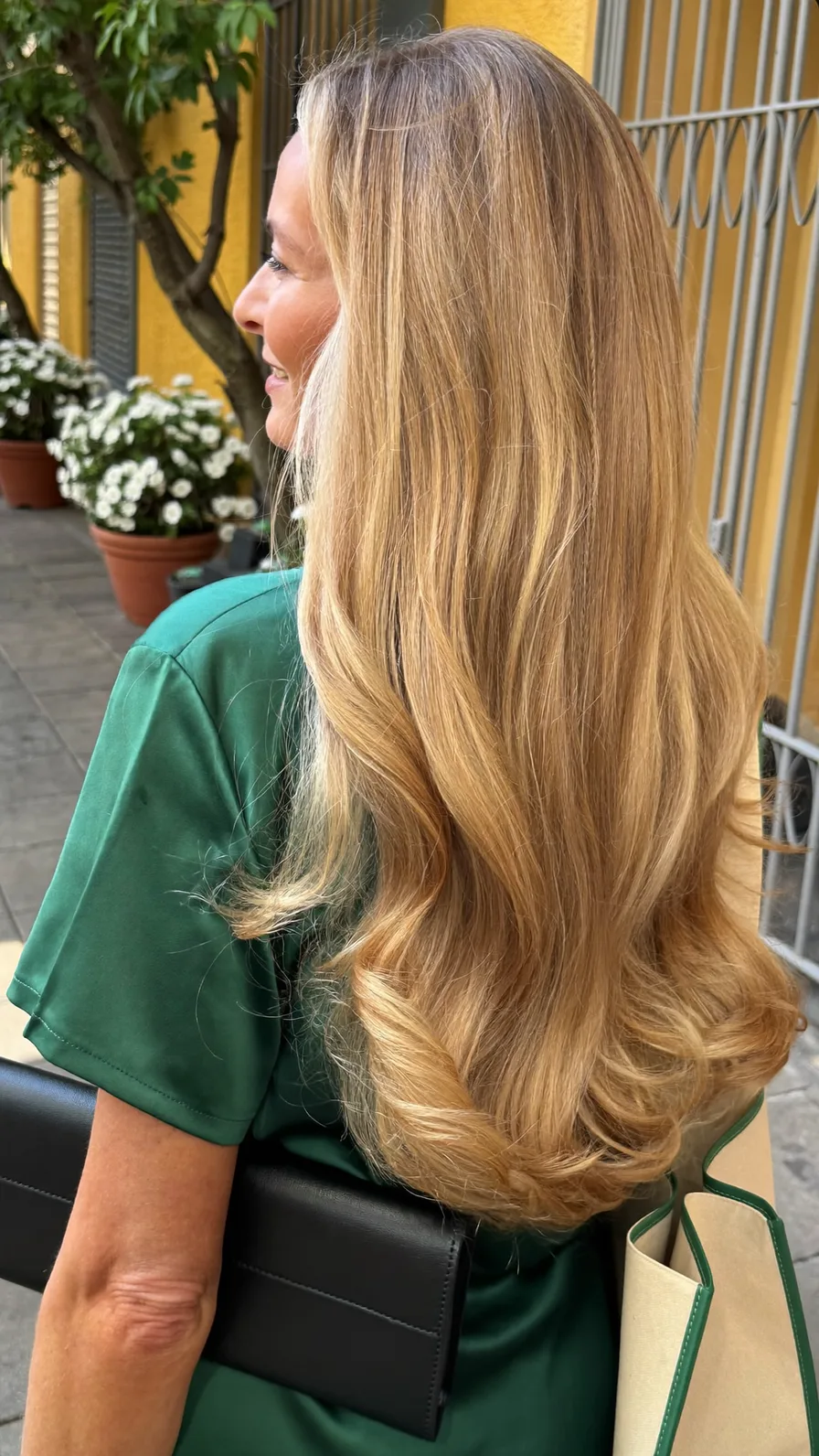 Sophisticated Long Layered Waves with Warm Golden Blonde Highlights