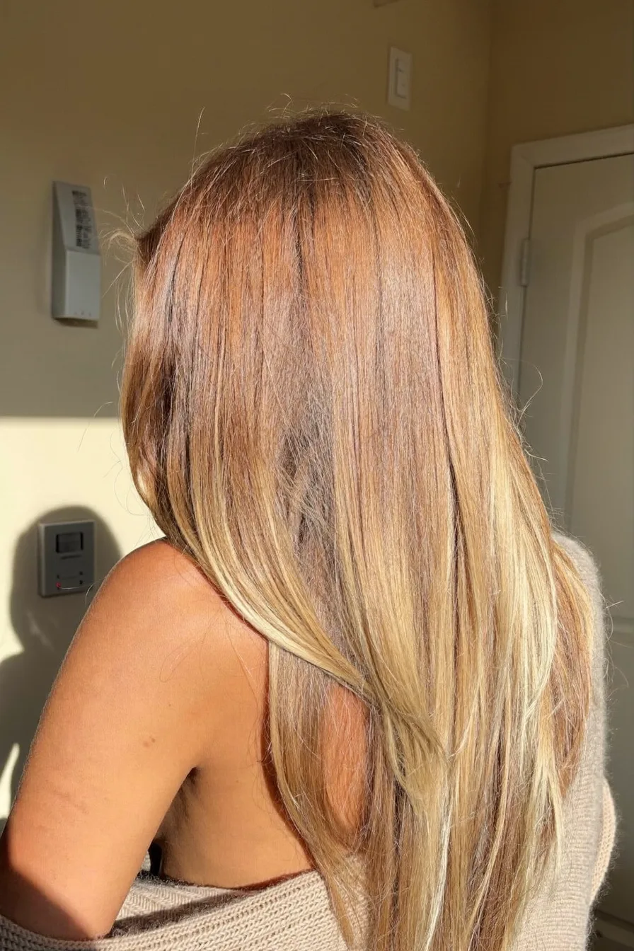 Long Layered Blonde Hair with Warm Balayage Highlights