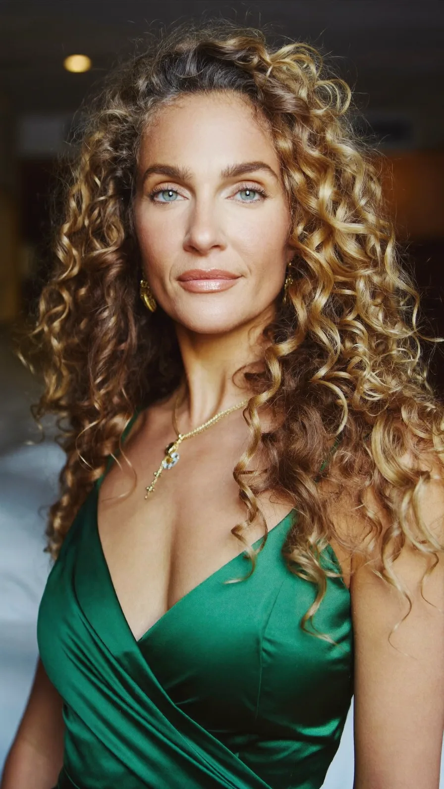 Voluminous Curly Long Layers with Golden Balayage Highlights