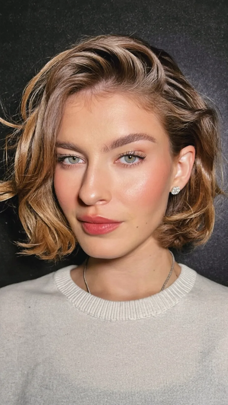 Textured Chin-Length Layered Bob with Side-Swept Highlights