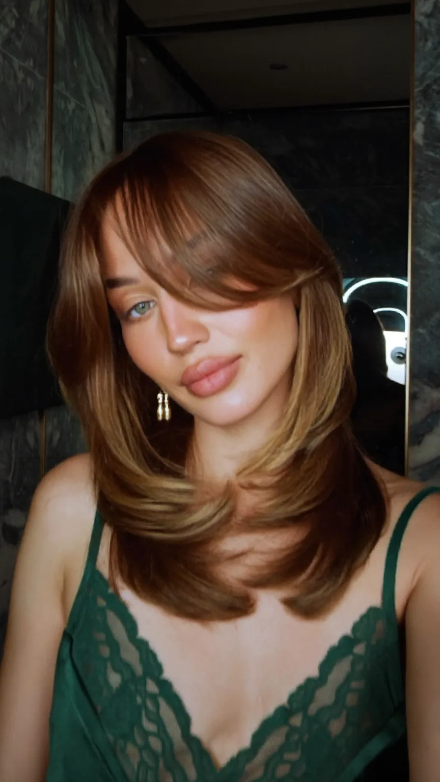 Modern Shoulder-Length Hairstyle with Soft Curtain Bangs