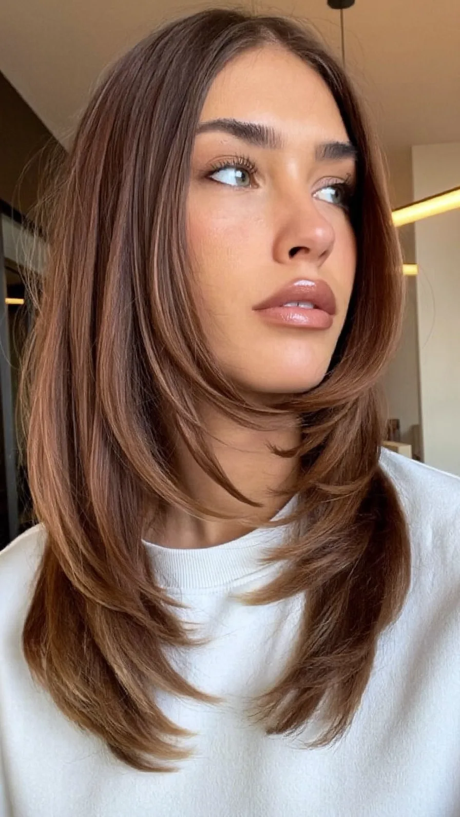 Medium-Length Feathered Hair with Long Flowing Layers