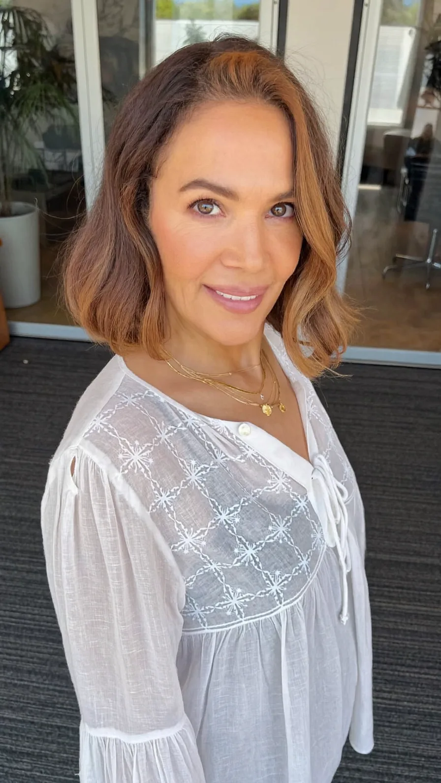 Chin-Length Wavy Bob with Golden Caramel Balayage Highlights