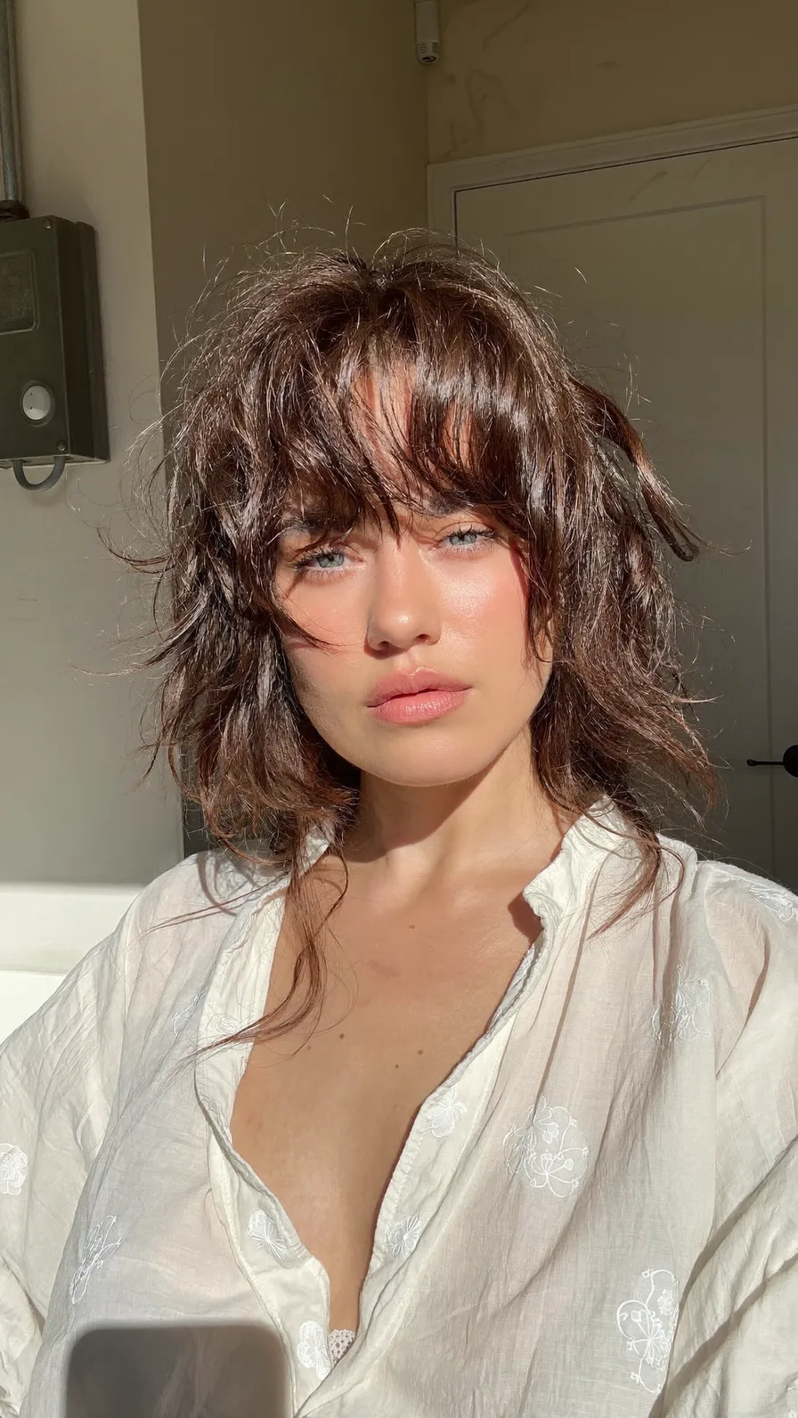 Textured Chin-Length Shag with Curtain Bangs and Volume