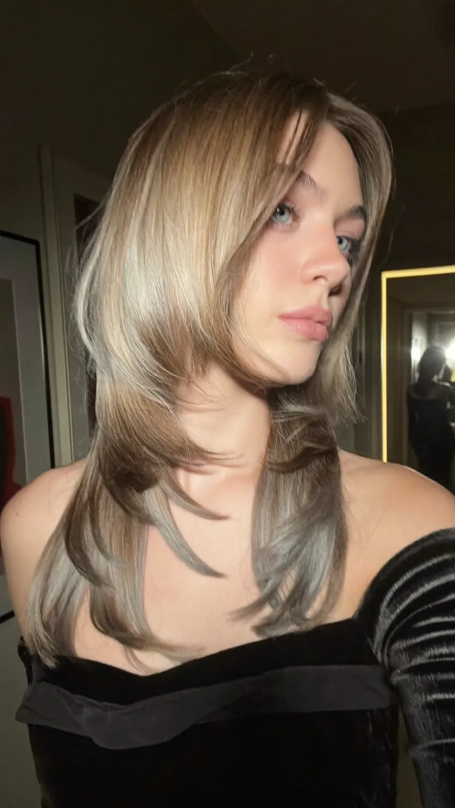 Modern Shag with Curtain Bangs and Flicked Layered Ends