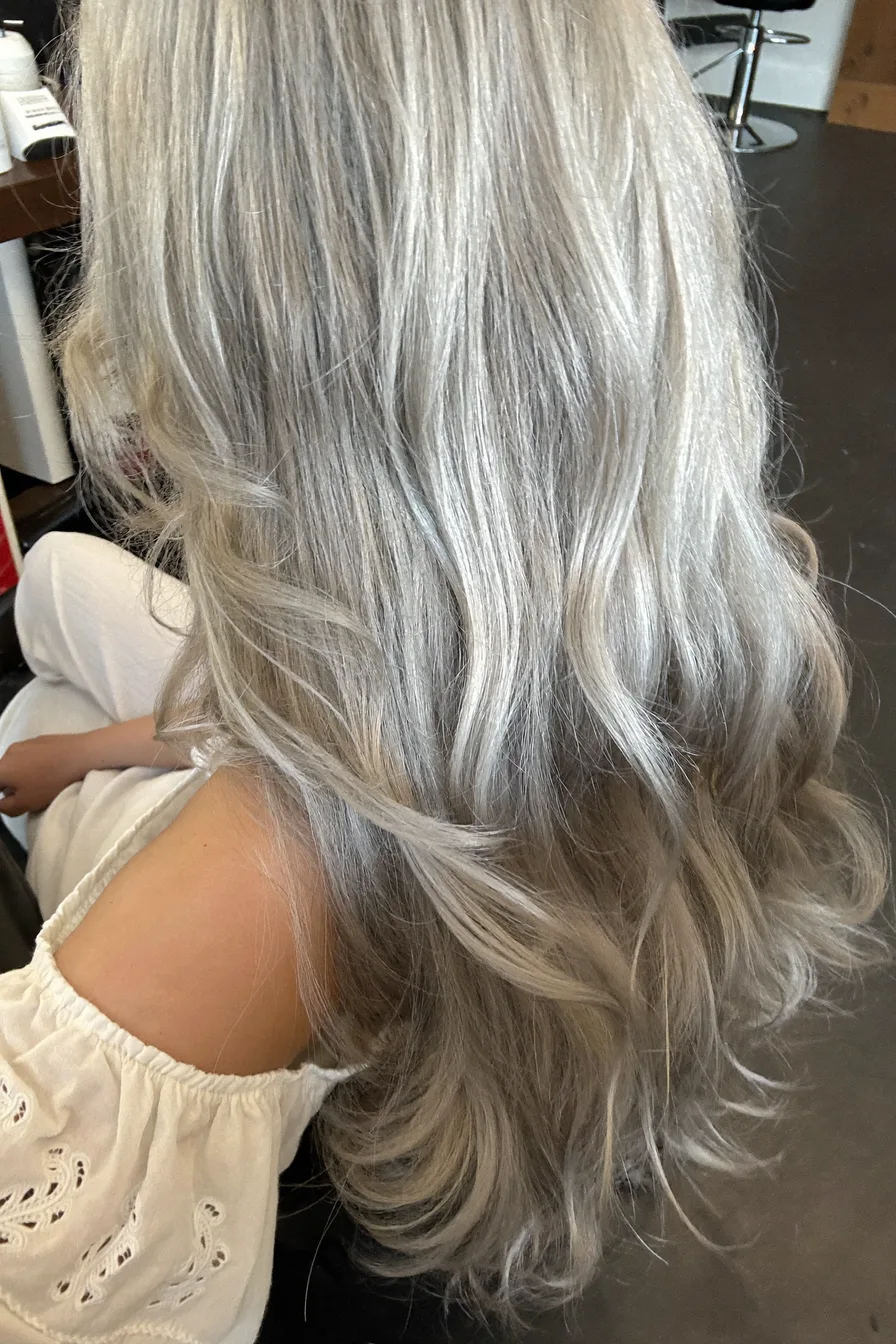 Soft, Flowing Mid-Back Length Layered Cut for Added Movement