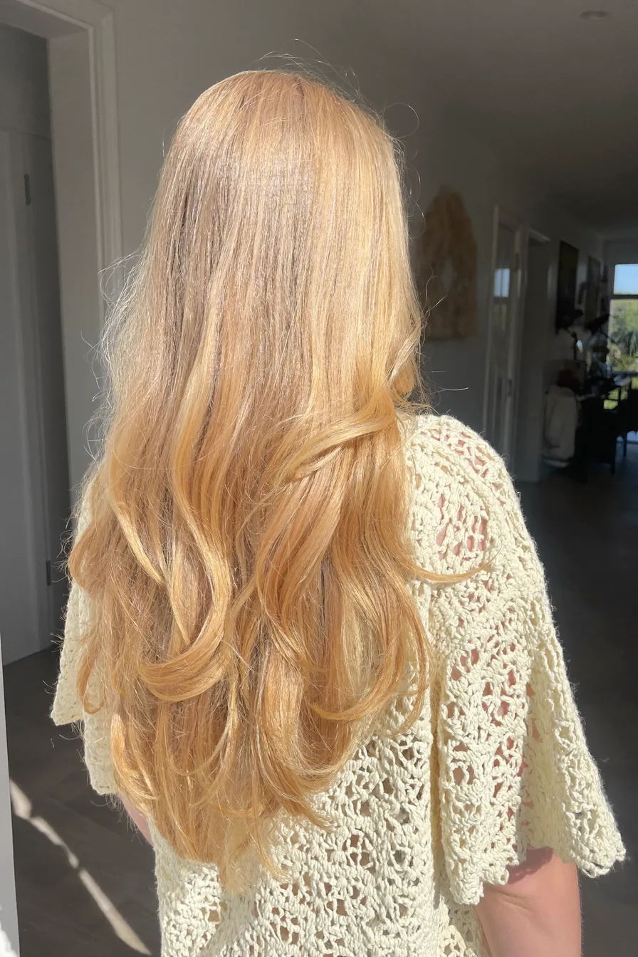Soft Golden Mid-Back Length Layered Hair with Natural Flow