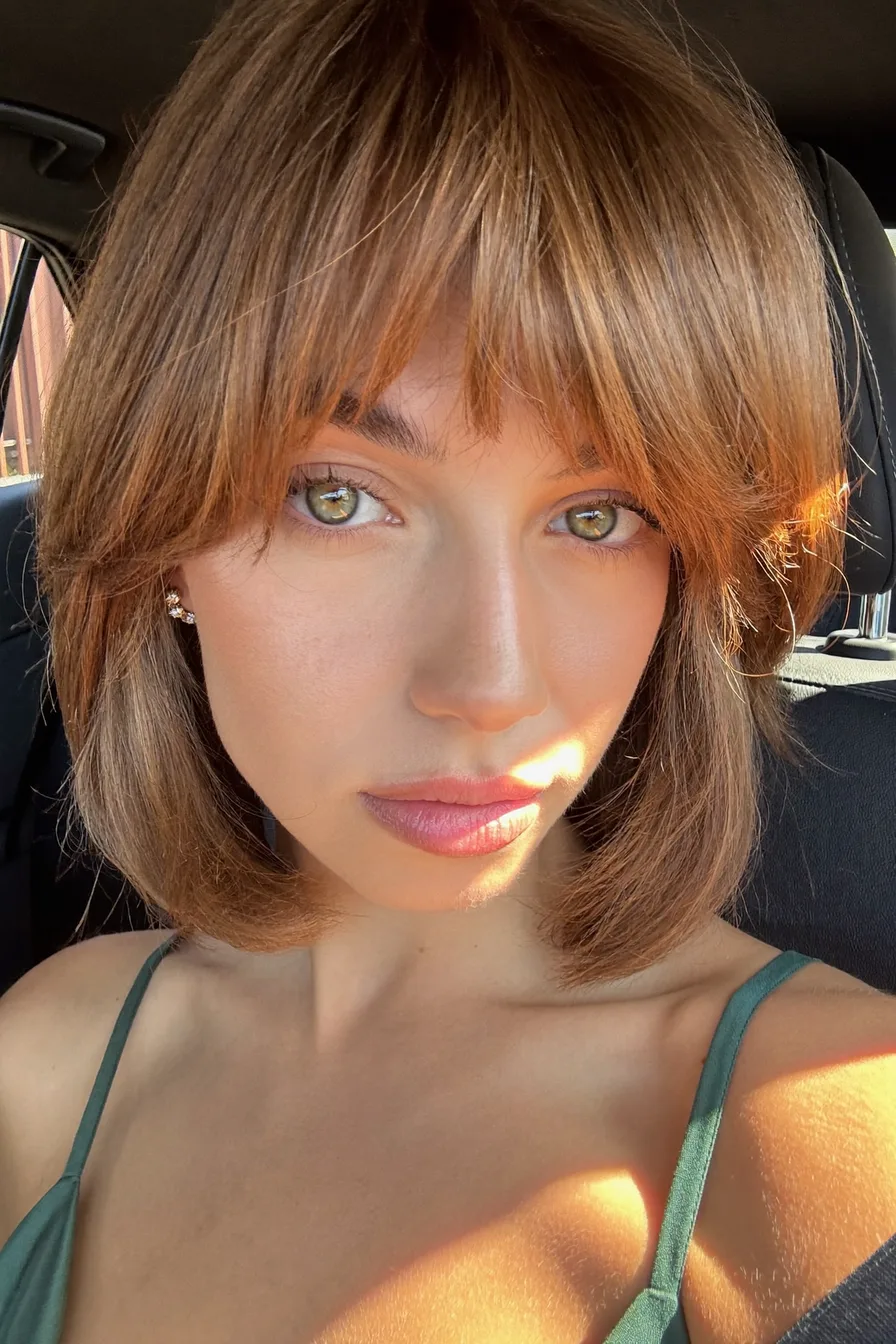 Textured Chin-Length Shag with Curtain Bangs and Highlights