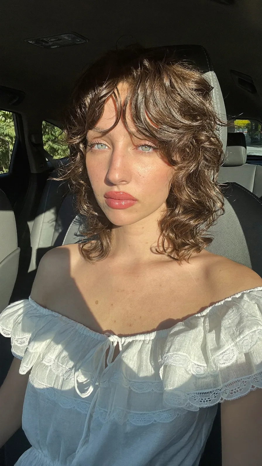 Textured Shoulder-Length Shag with Curtain Bangs Hairstyle