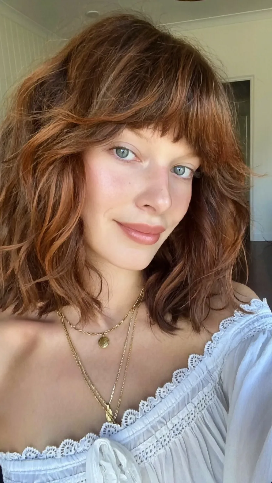 Modern Textured Shoulder-Length Shag with Micro Bangs