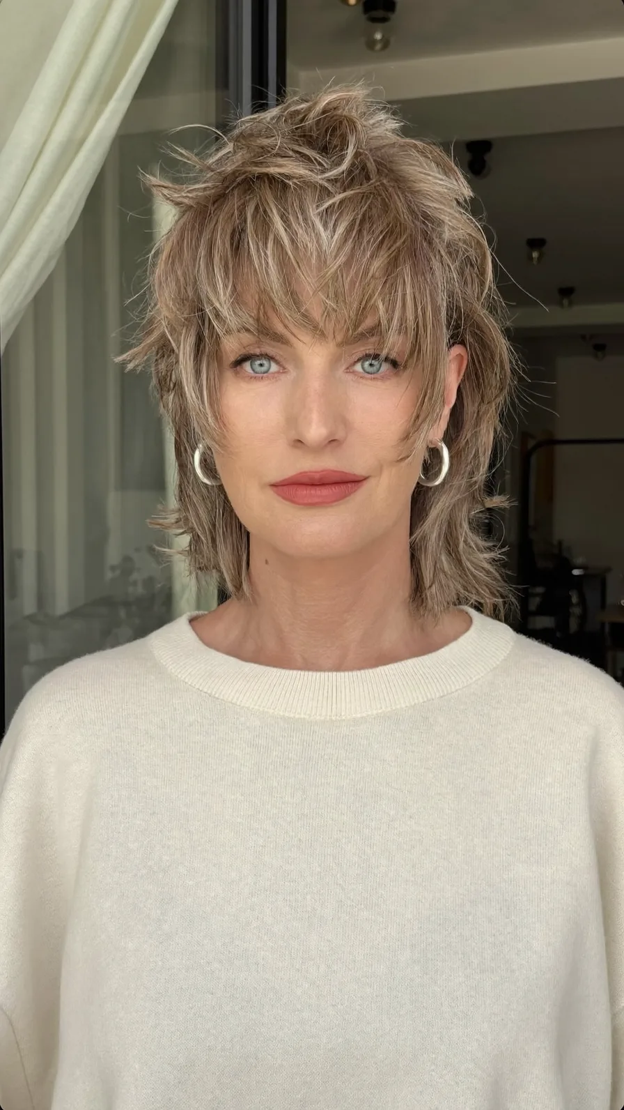 Textured Ash Brown Shag with Wispy Bangs and Highlights