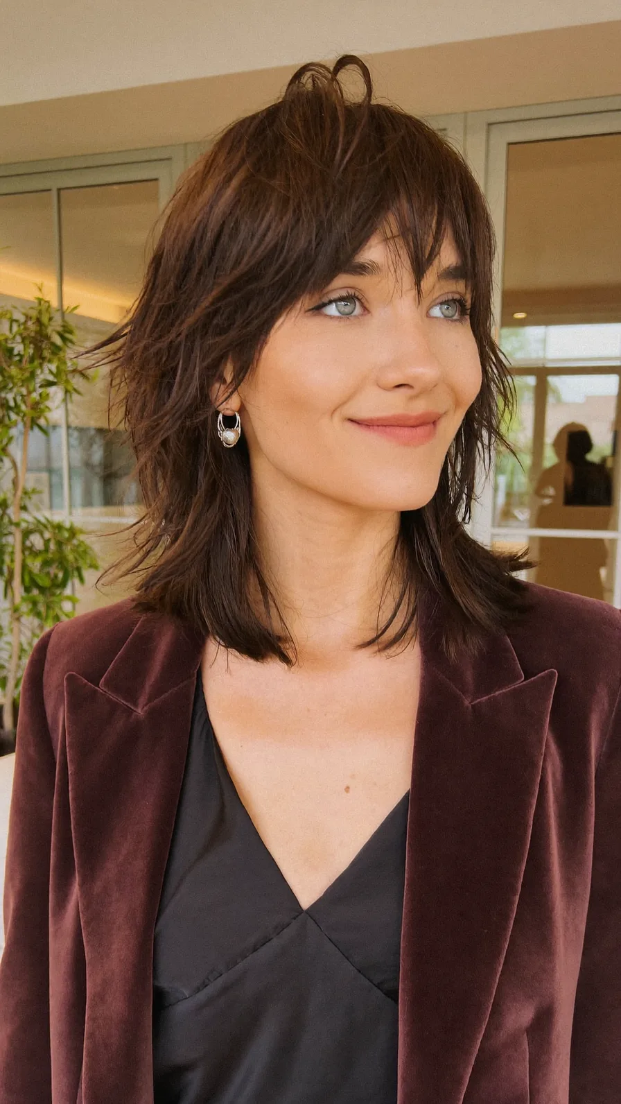 Textured Medium Shag with Wispy Side Bangs for Effortless Style