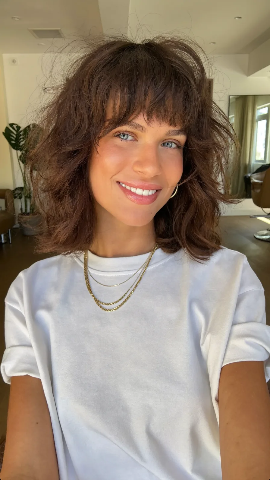 Textured Shoulder-Length Shag with Blunt Bangs for Volume