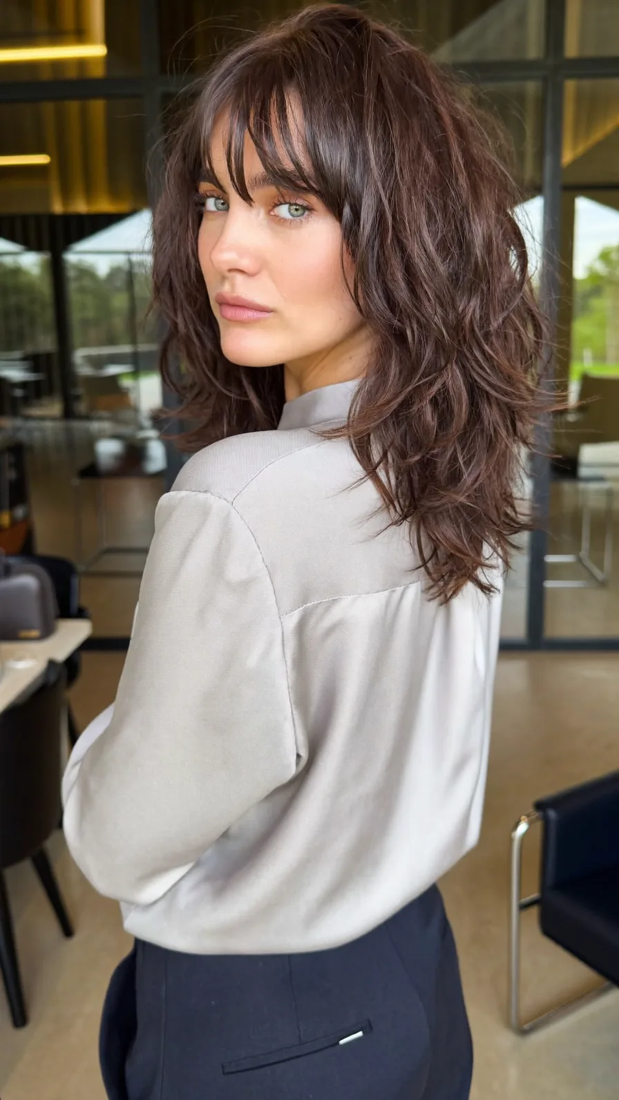 Voluminous Layered Shag with Curtain Bangs for Medium Hair