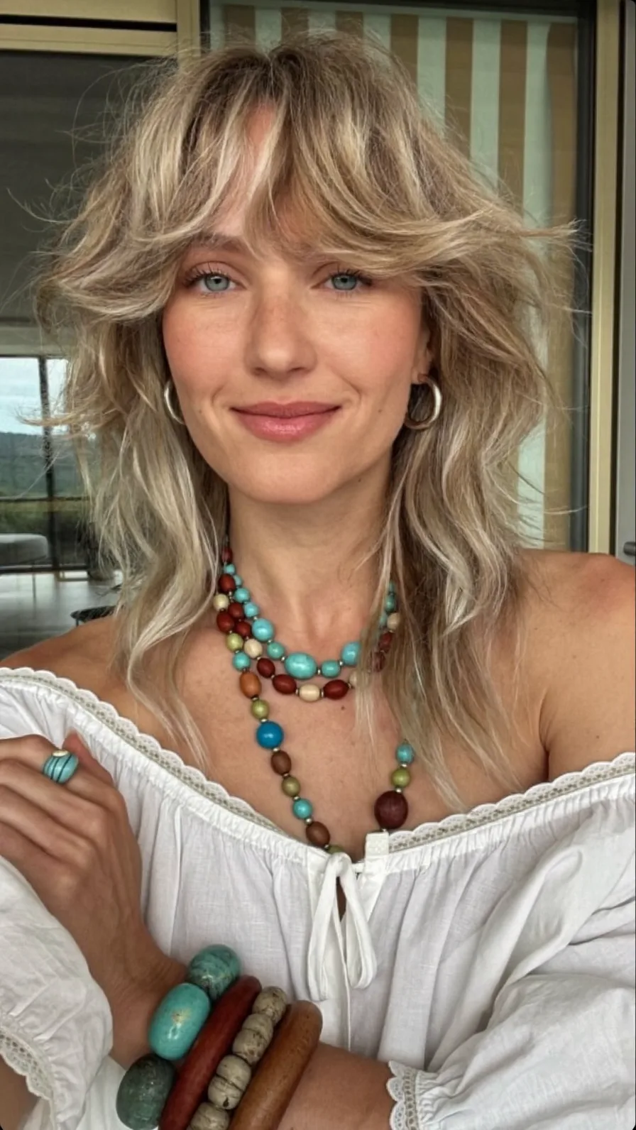Voluminous Ash Blonde Shag with Textured Curtain Bangs