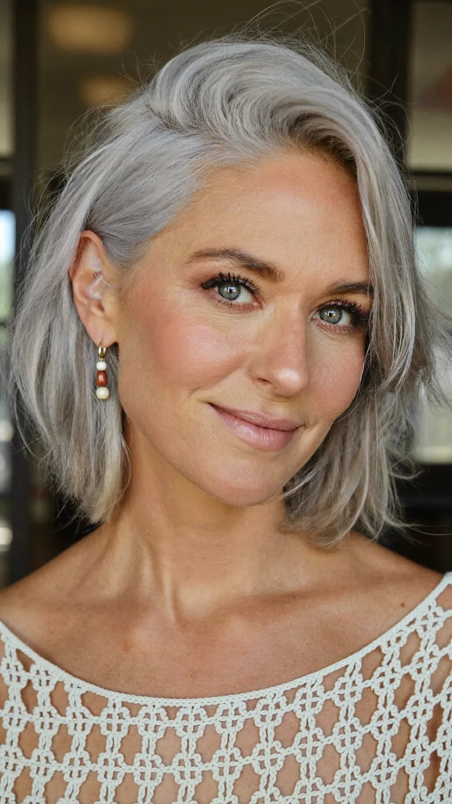 Elegant Shoulder-Length Silver Bob with Side-Swept Bangs