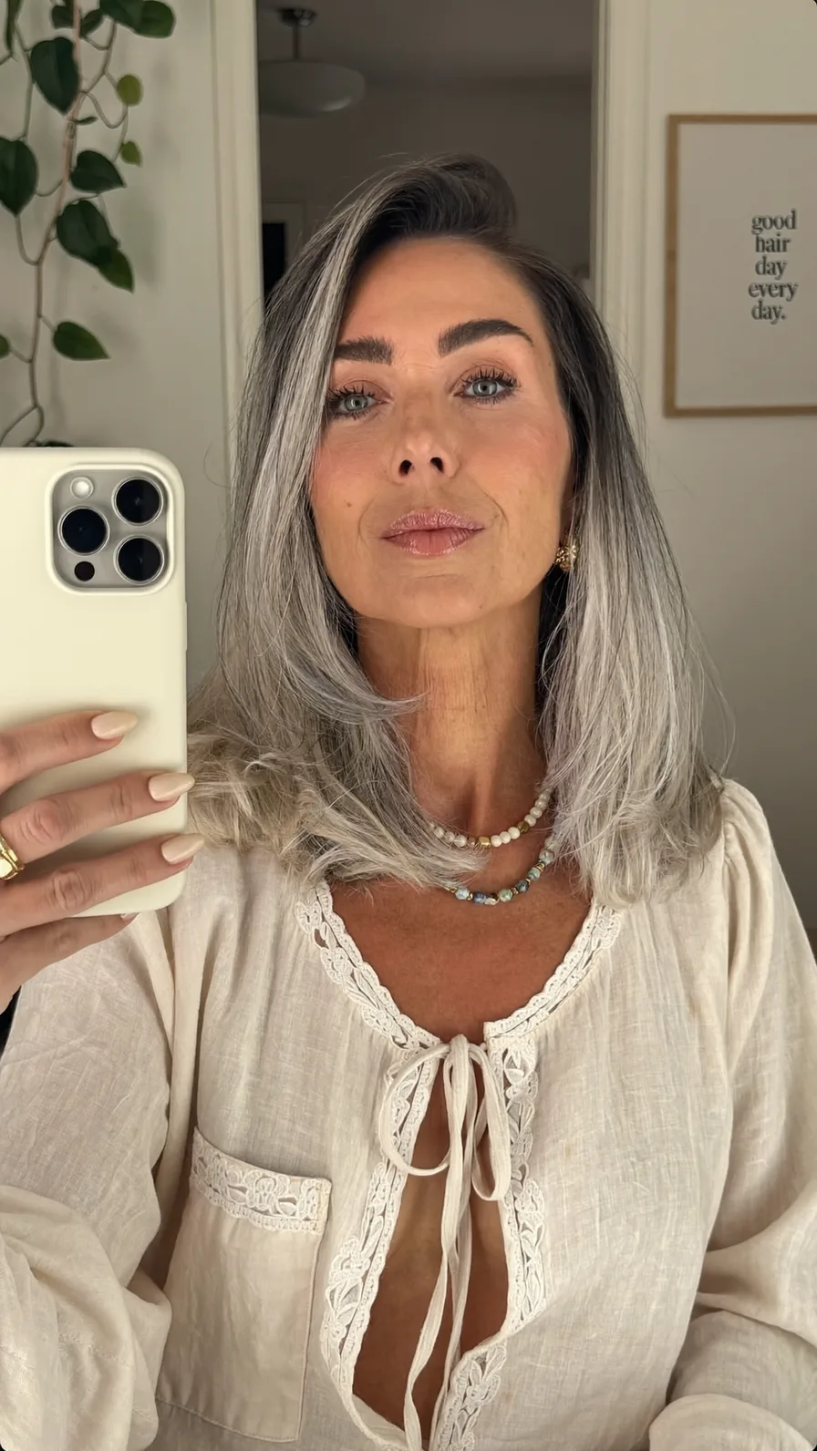 Elegant Shoulder-Length Silver Gray Hair with Long Layers