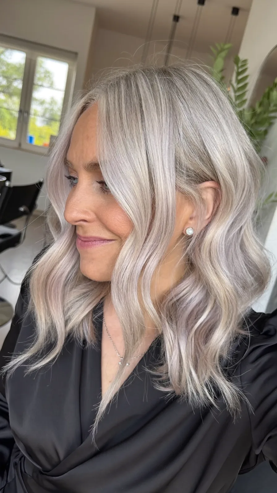 Modern Shoulder-Length Platinum Silver Hair with Soft Curtain Bangs
