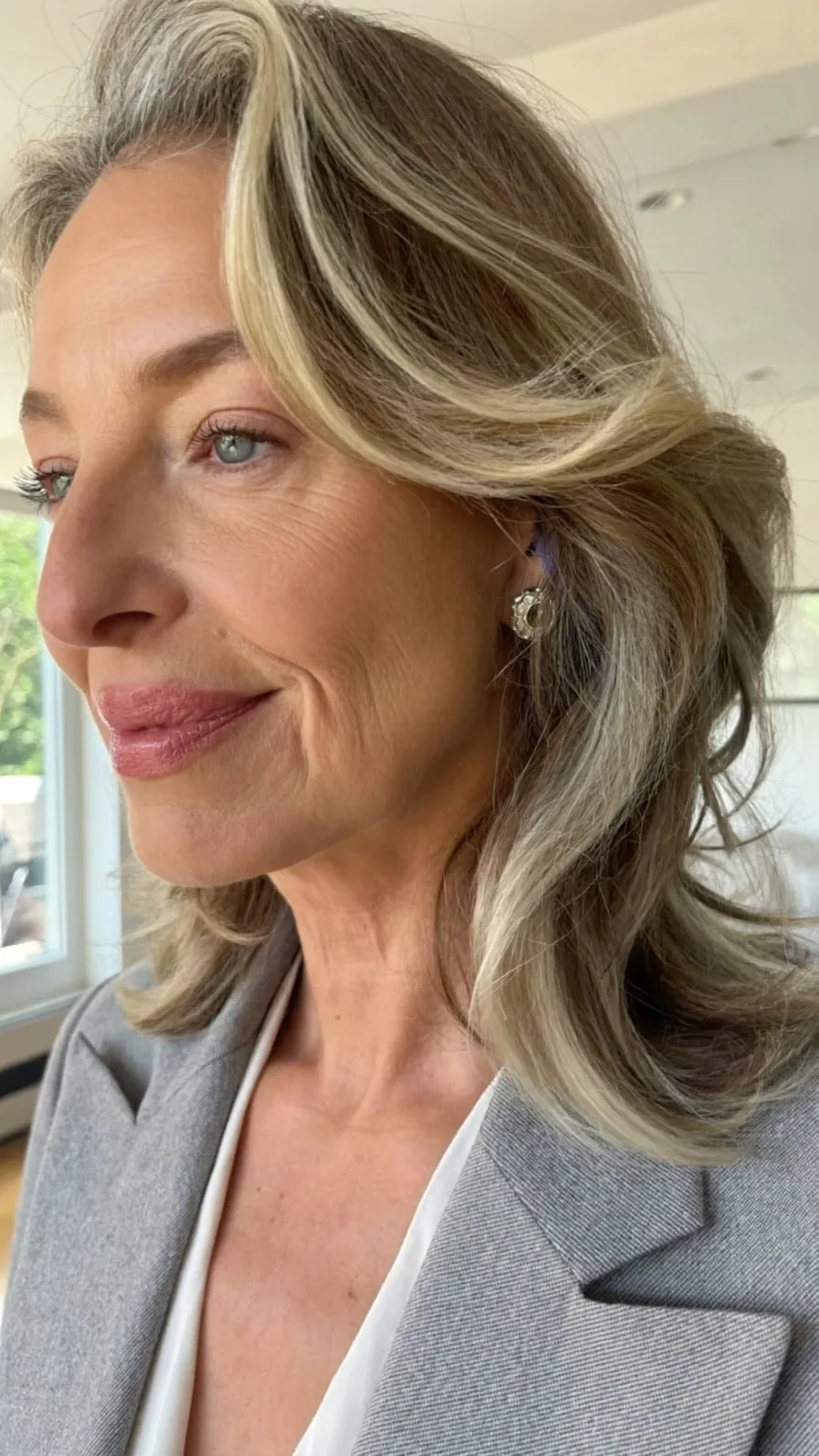 Elegant Medium-Length Ash Blonde Hair with Soft Long Layers