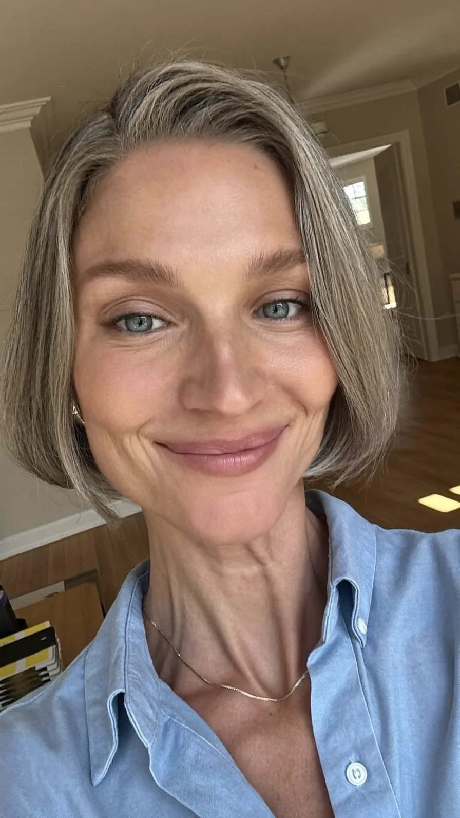 Elegant Chin-Length Silver Bob with Soft Side-Swept Bangs