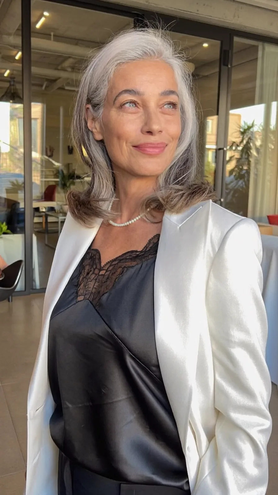Elegant Shoulder-Length Layered Silver Gray Hair with Flicked Ends